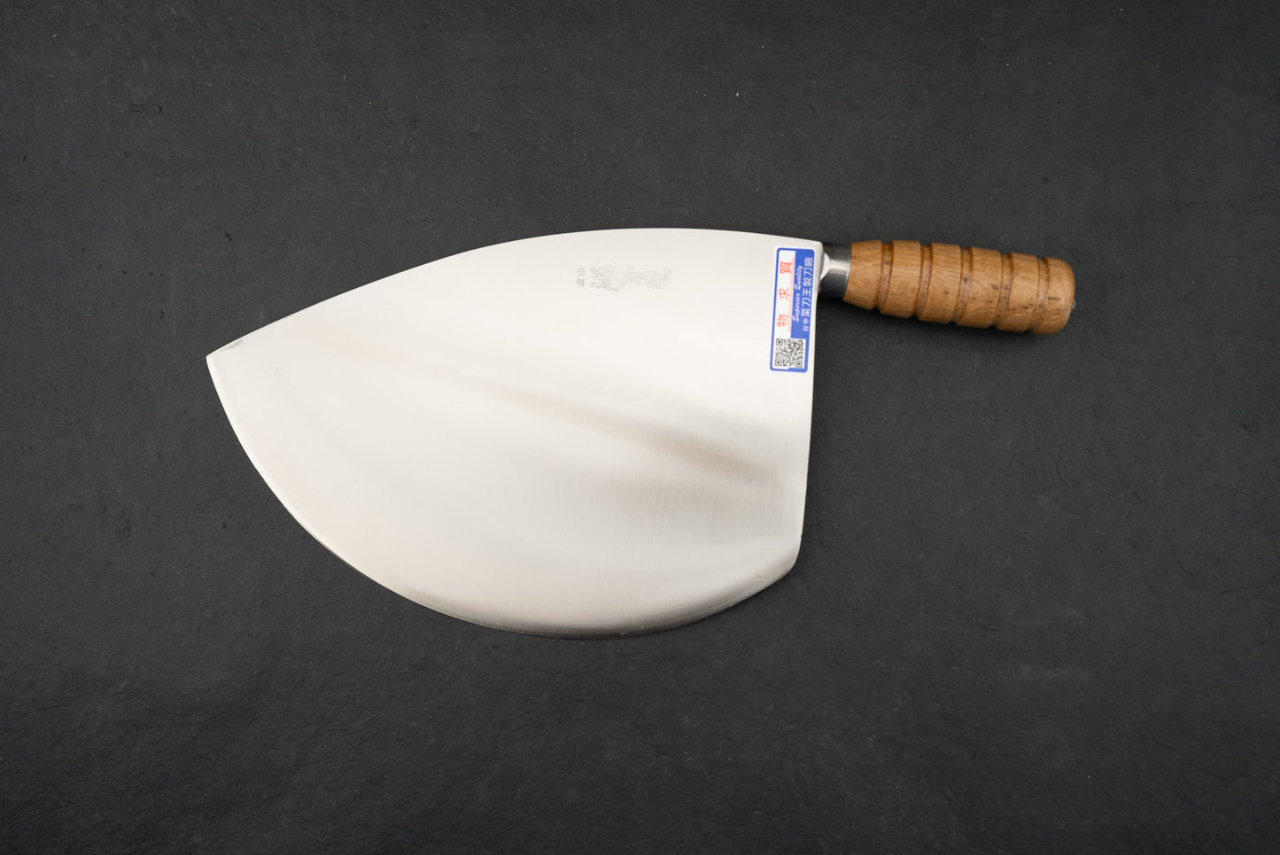 Chopper King VG1 Taiwanese Tuna Knife 265mm, featuring a half-moon stainless-steel blade with a grooved wooden handle, displayed flat. Ideal for versatile kitchen tasks, handcrafted with Japanese steel expertise.