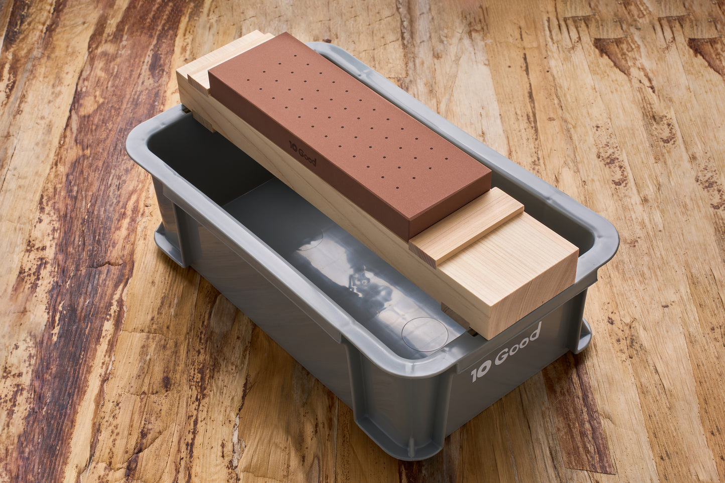 10 Good Togiba 5 Piece Set with waterstone, wooden base, and soaking tub for precise knife sharpening on display.