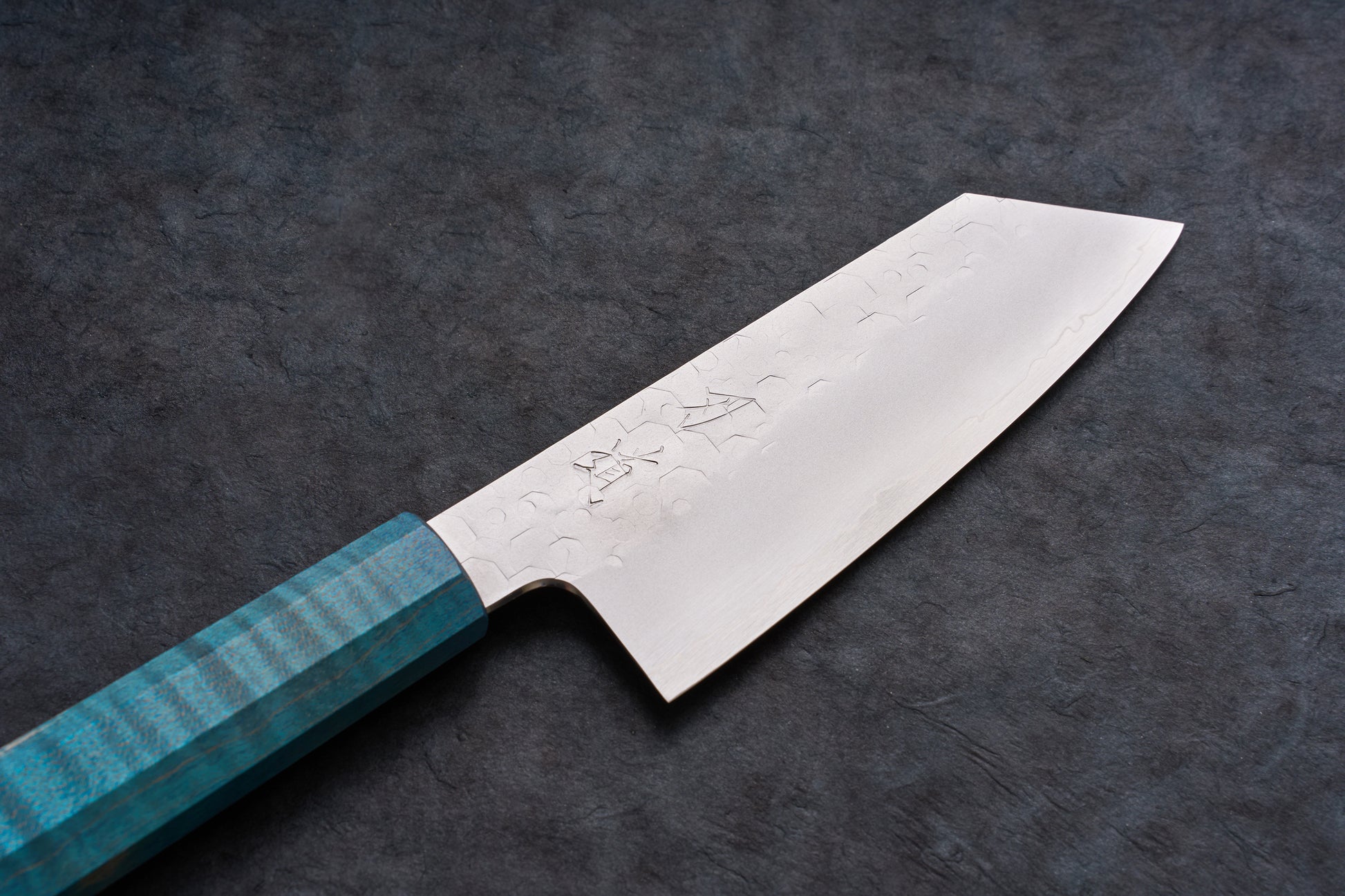 Blue Handle Hado Shiosai Ko-Bunka 135mm knife with a hammered blade and vibrant teal handle, showcasing exquisite craftsmanship and premium SG2 steel.