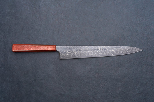 Mazaki Aoichi Beads Black Damascus Sujihiki 300mm: a sleek, Damascus-patterned Japanese-style knife with a reddish wooden handle, ideal for precise slicing of meats and fish.