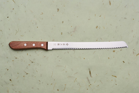 TOJIRO Bread Slicer 235mm F-737 with a serrated blade and wooden handle, crafted in Japan, ideal for effortlessly slicing hearty loaves.