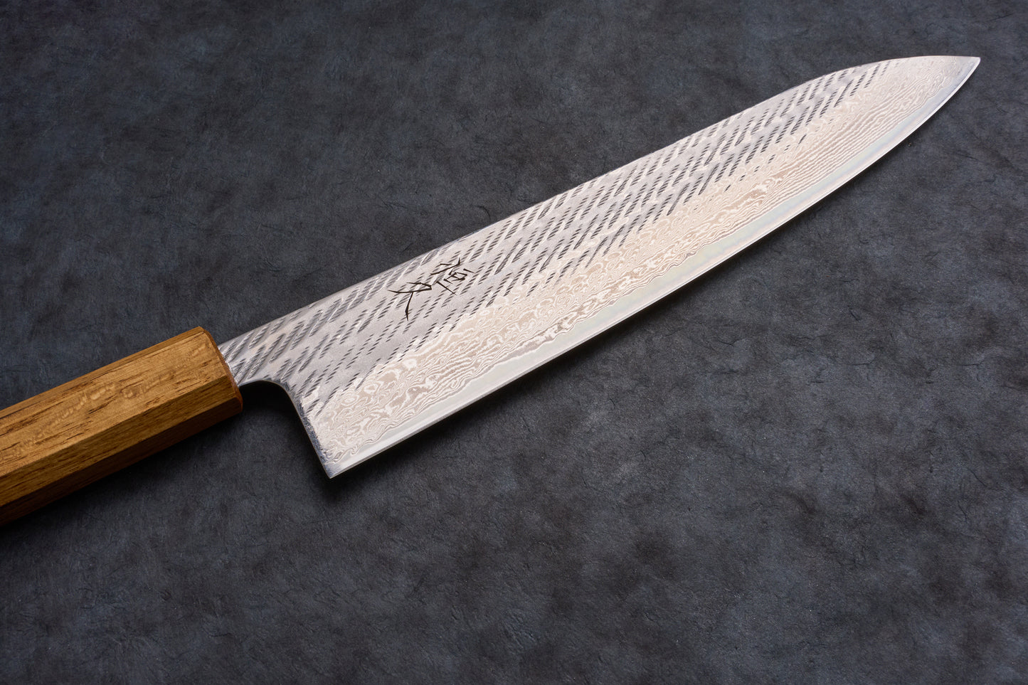 Tsunehisa AUS10 Sanjushichi 参拾漆 Nawame Damascus Gyuto 240mm T-03709, featuring a patterned steel blade and wooden handle, displayed on a dark surface.
