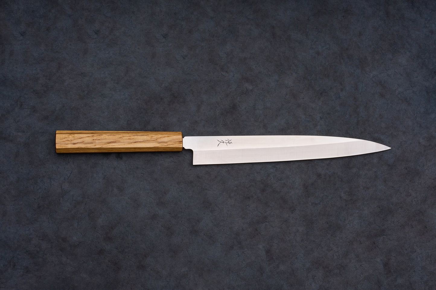 Tsunehisa AUS8 Sanjukyu 参拾玖 Migaki Yanagiba 240mm T-03918, a sleek Japanese sashimi knife with a polished steel blade and wooden handle, laid horizontally.