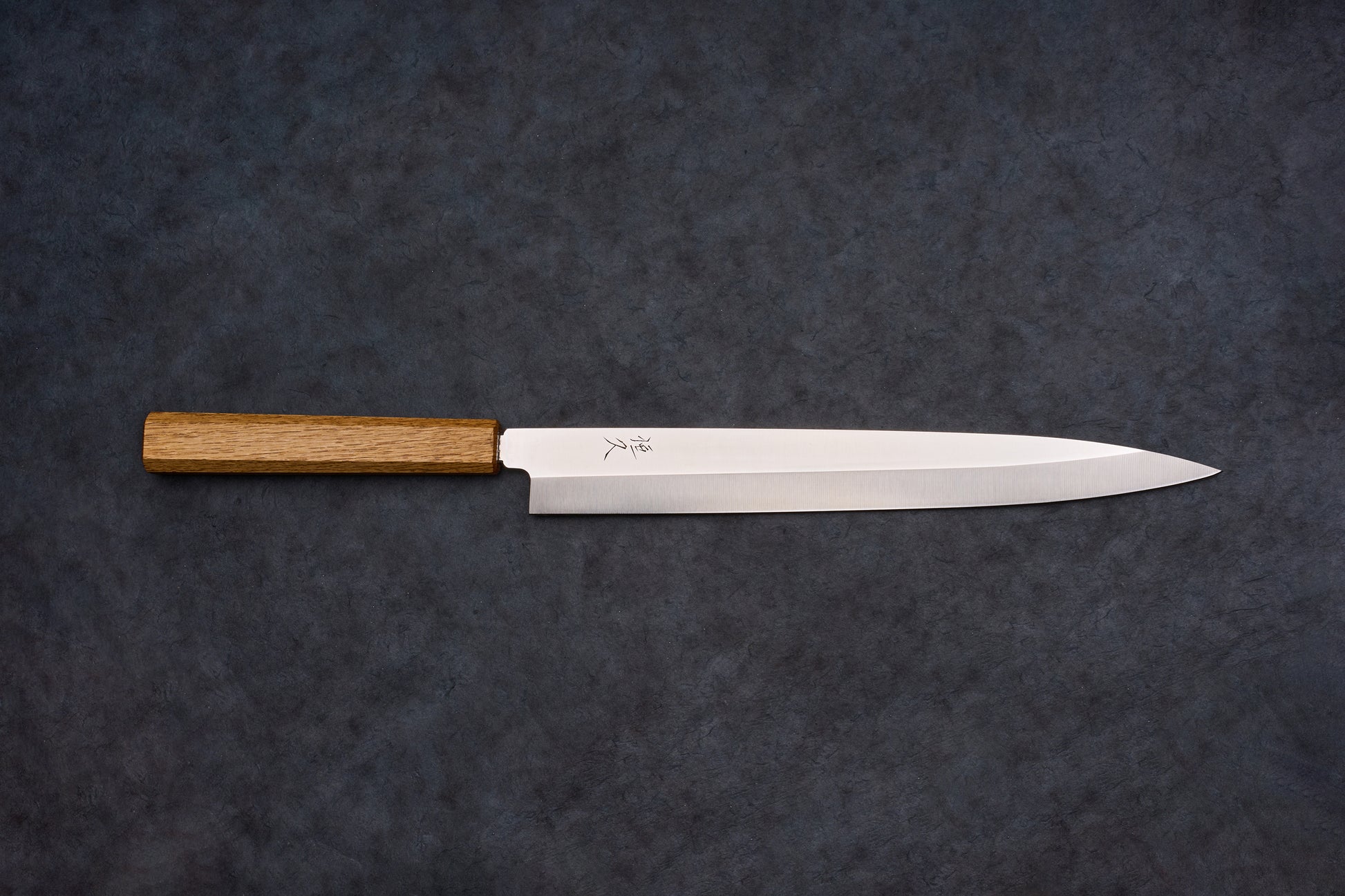 Tsunehisa AUS8 Sanjukyu 参拾玖 Migaki Yanagiba 270mm T-03919, a single-bevel Japanese slicing knife, features a steel blade with engraved characters and an octagonal wooden handle.