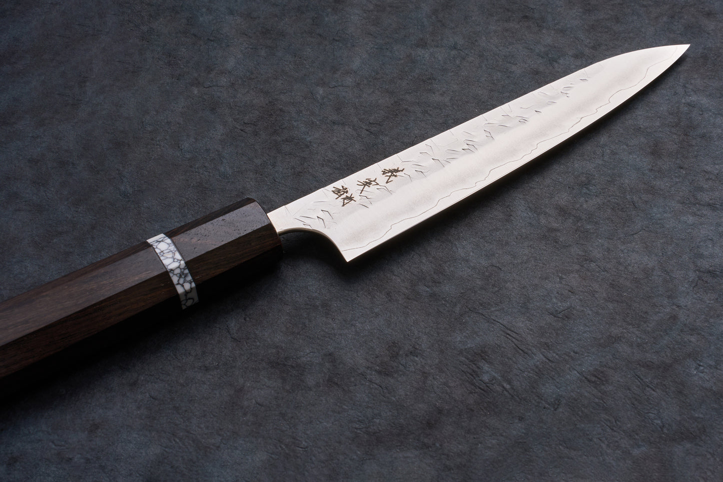 Yoshimi Kato SG2 Hyo Petty 150mm knife with a polished steel blade, engraved characters, and an octagonal wooden handle with a decorative spacer ring.