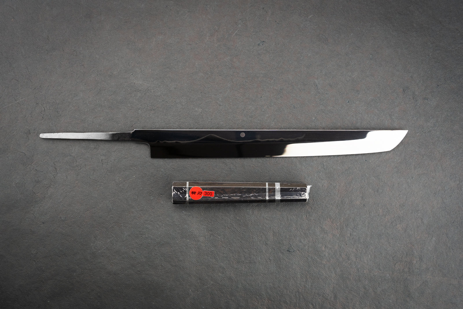 https://knifewear.com/cdn/shop/files/genkai-masakuni-honyaki-takohiki-300-1_1600x.jpg?v=1690486446